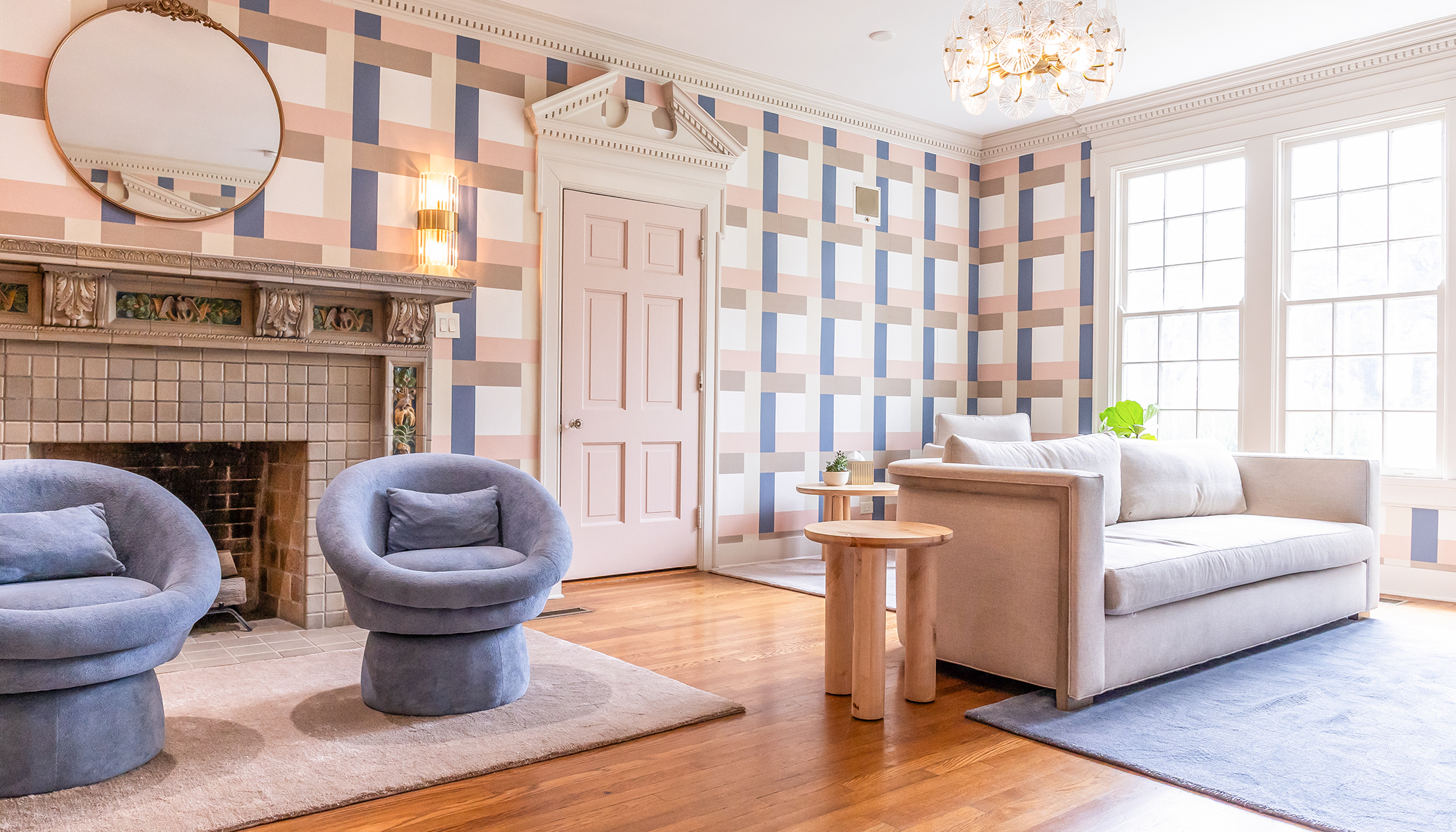 Welcoming room with hardwood floors and a fireplace