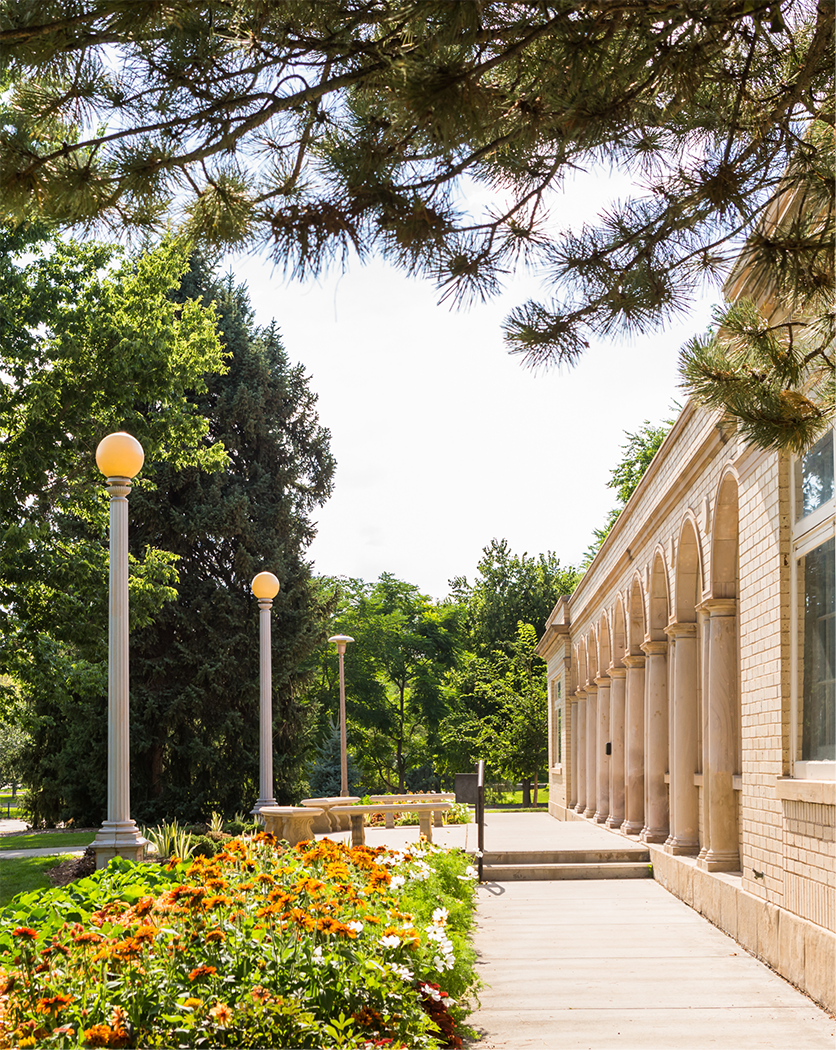 Walkway next to an archway on one side of a university building