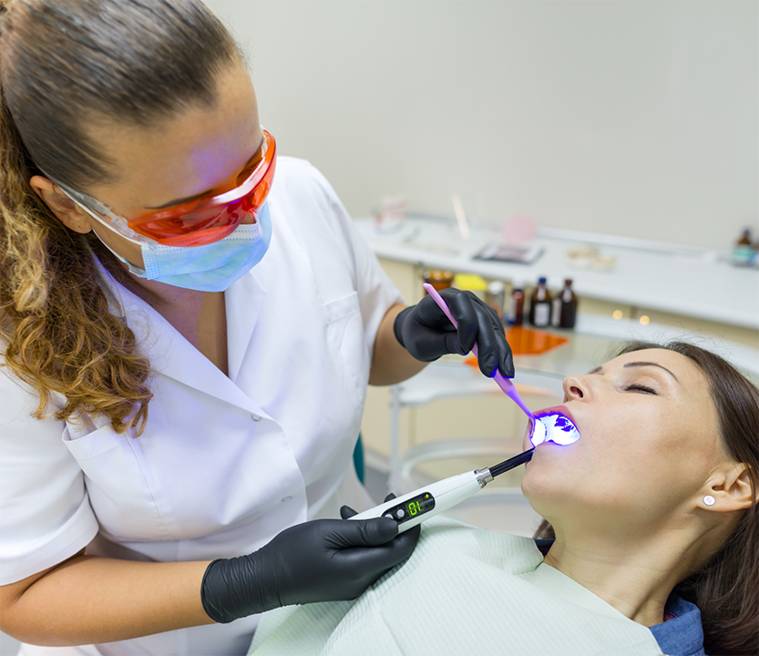 Relaxed woman getting dental work done