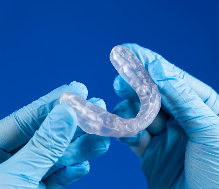 Holding a clear occlusal splint tray